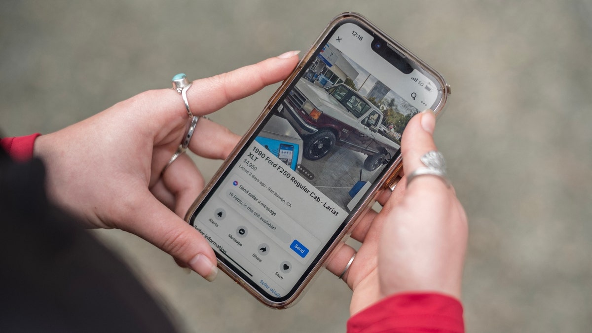 Ruby Hammer searches for used cars on Facebook marketplace near her home in Felton, California, on January 26, 2024.