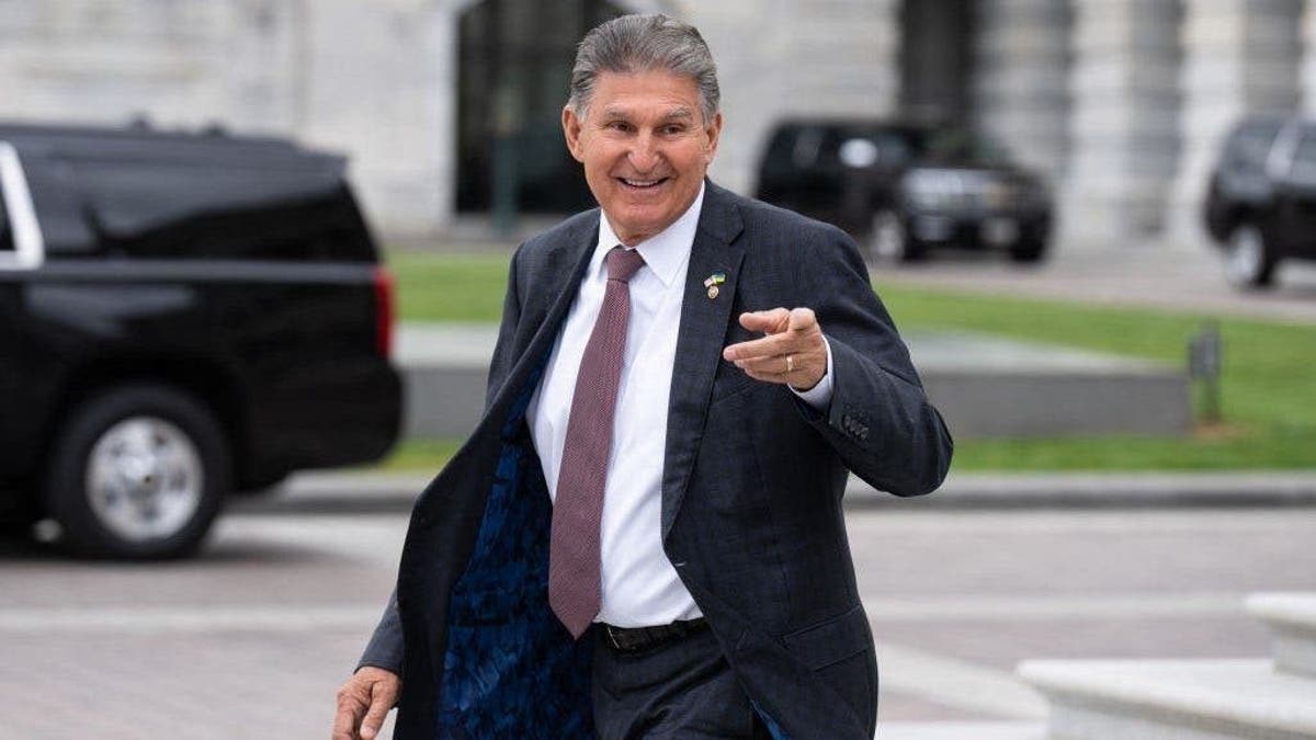 Manchin pointing