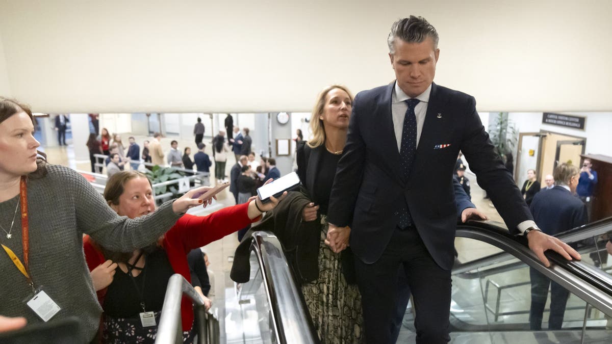 Pete Hegseth with reporters on Capitol Hill