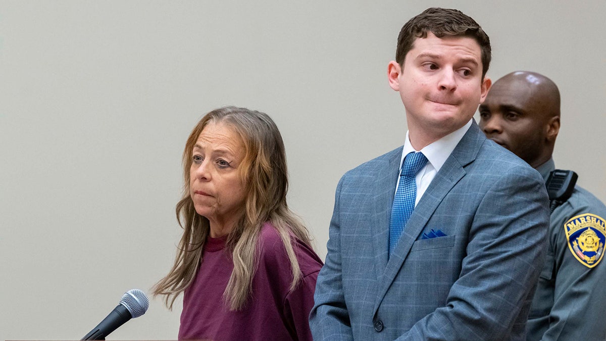 Kimberly Sullivan in court with her lawyer.