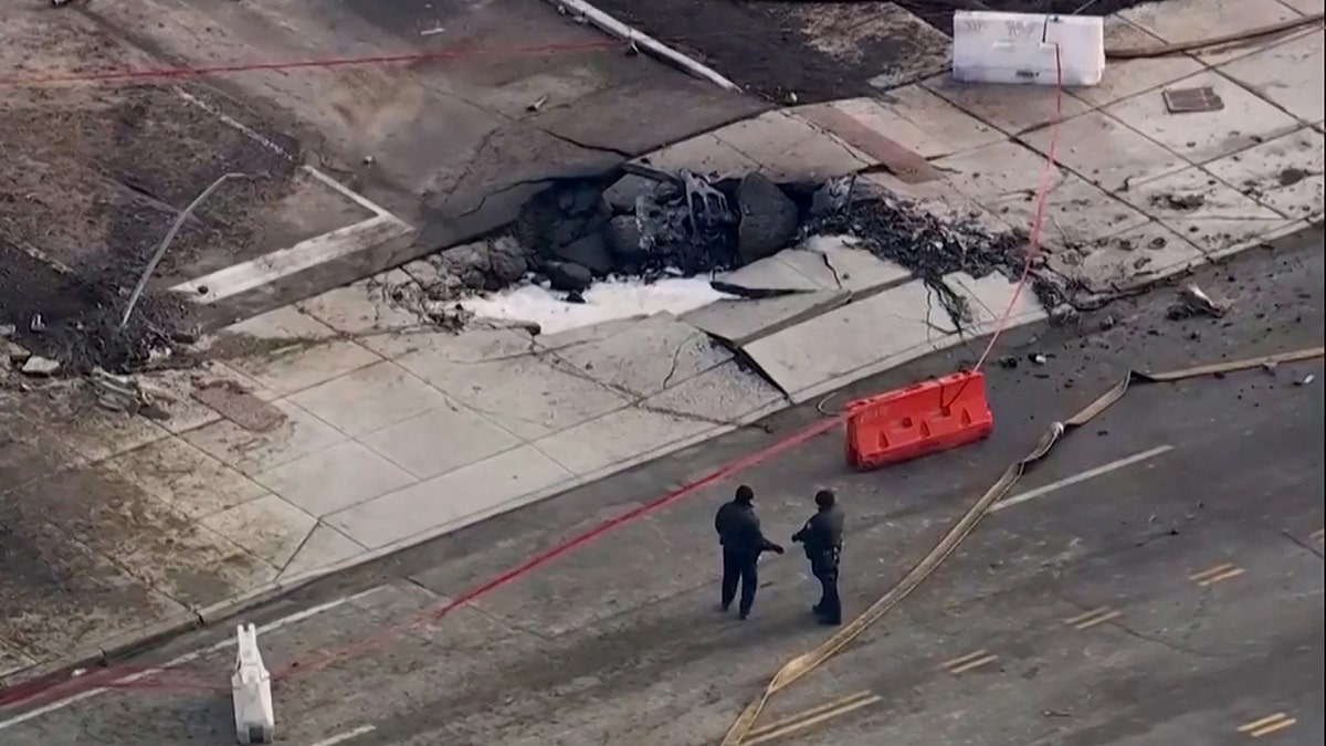 A crater remains a day after the deadly crash of a medevac plane operated by Mexico-based Jet Rescue Air Ambulance in Philadelphia