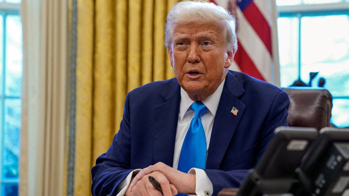 FILE PHOTO: U.S. President Donald Trump at the Oval Office in the White House