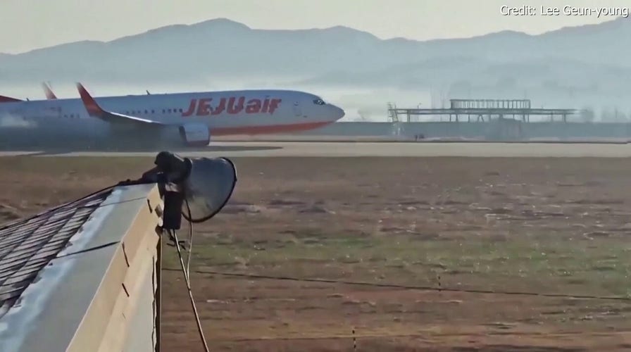 Video captures moments before South Korean plane crashes into concrete fence