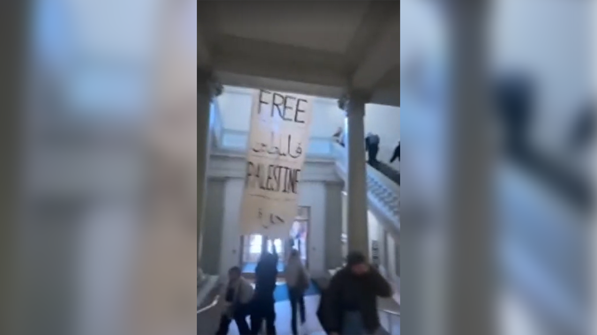 free palestine flag hangs inside Barnard College