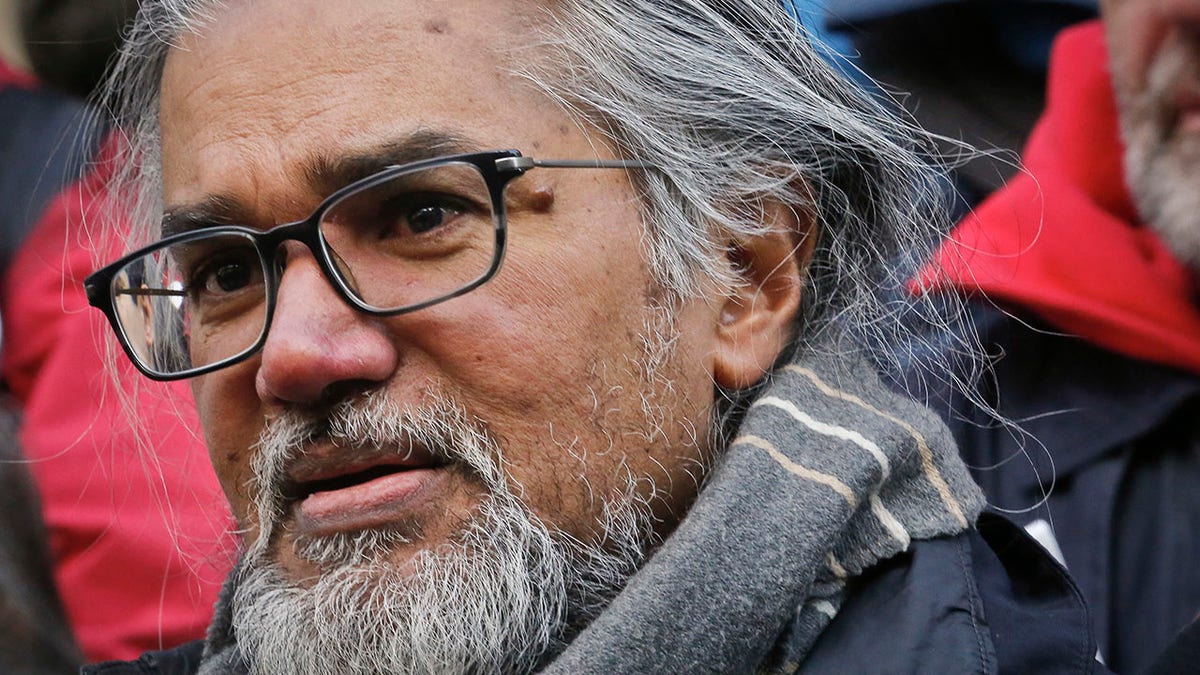 Immigration activist Ravi Ragbir, listens during a news conference at New York City Hall called by city council members on his behalf, Jan. 31, 2018. 