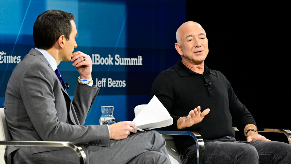 Jeff Bezos speaks on stage