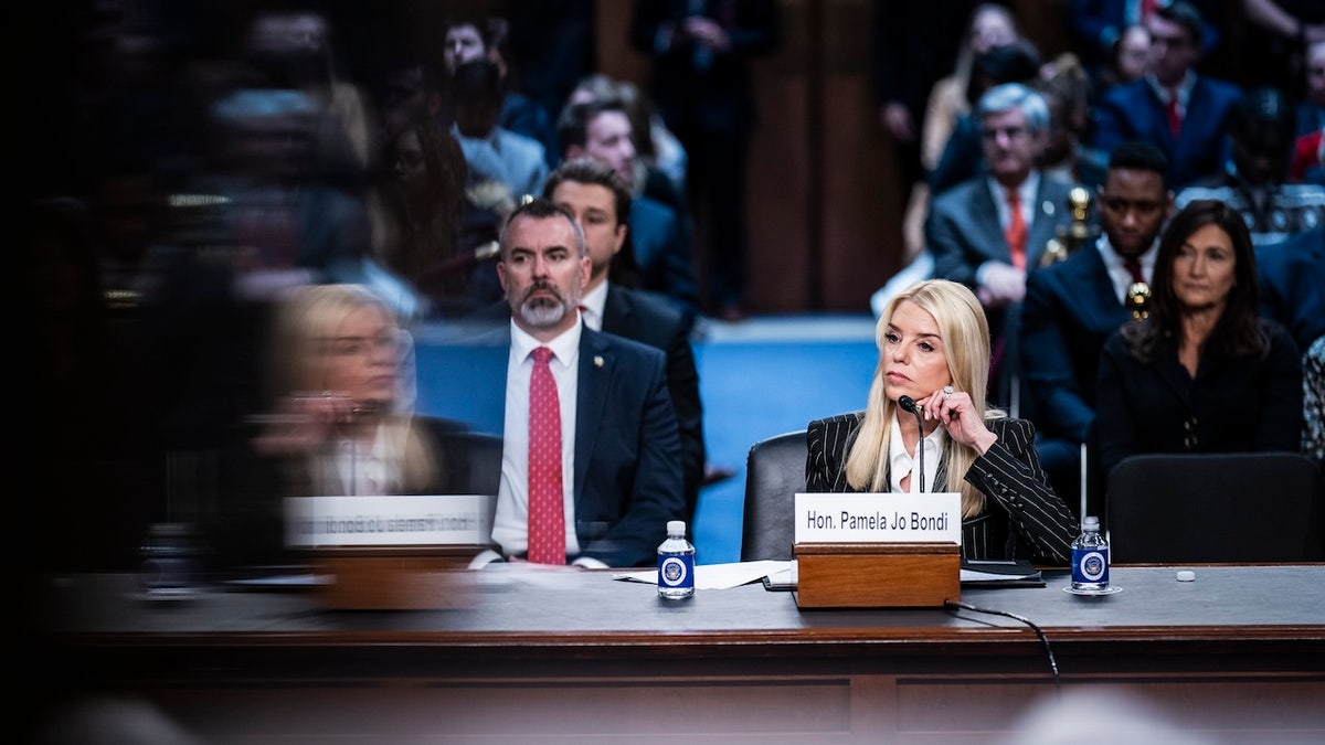 Pam Bondi sits for a confirmation hearing to be US attorney general.