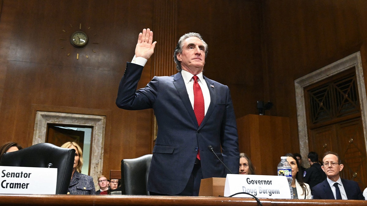 Former North Dakota Governor Doug Burgum is sworn in during a Senate Energy and Natural Resources Committee hearing on his nomination to be Secretary of the Interior, on Capitol Hill in Washington, DC, on January 16, 2025.