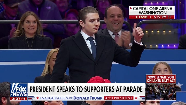 President Trump introduces son Barron during inauguration parade.