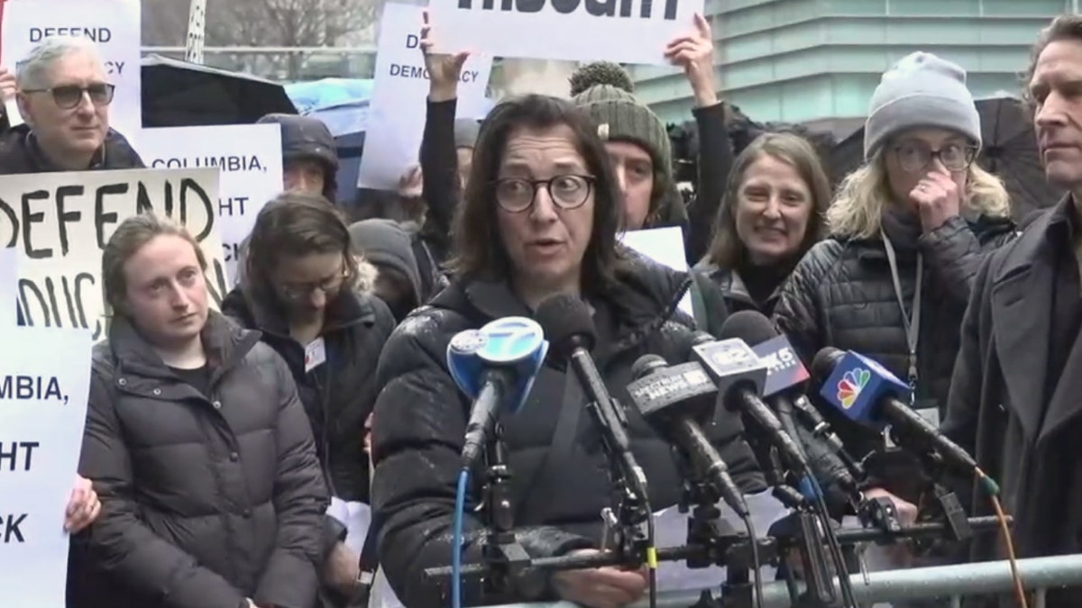 Columbia faculty held an "emergency vigil" outside the university's gates to protest recent policy changes.