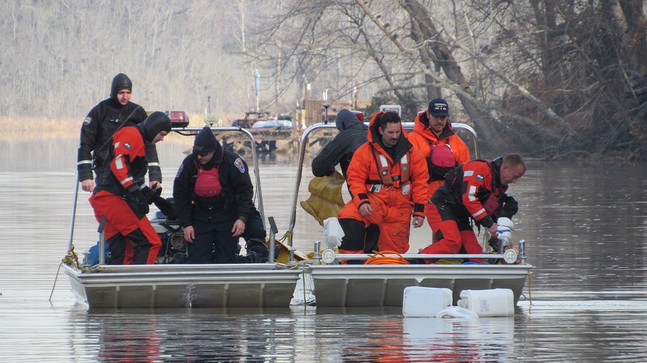 Diver Jake Crockett and other members of the Scuba Rescue Team with Chesterfield Fire & EMS during a Dec. 2023 dive mission