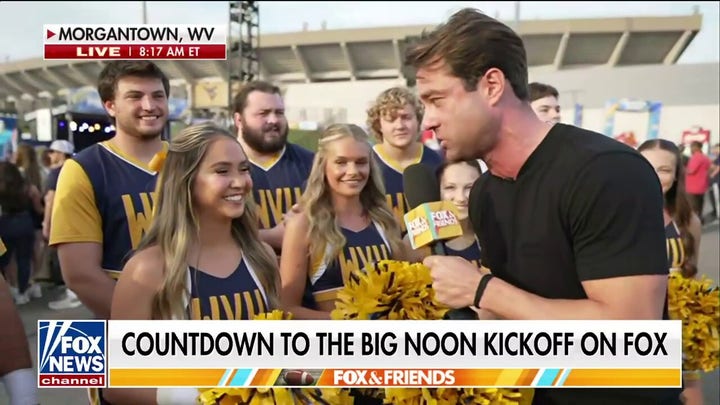 WVU cheer team rallies 'Fox & Friends Weekend' ahead of game against Penn State.