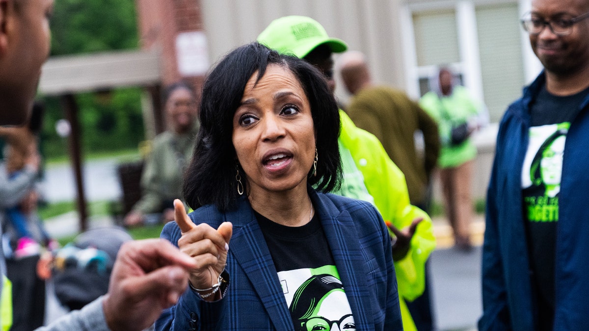 Angela Alsobrooks, Democratic U.S. Senate candidate from Maryland, and Gov. Wes Moore, D-Md., are seen while greeting voters on the state's primary election day at Lewisdale Elementary School in Chillum, Md., on Tuesday, May 14, 2024.