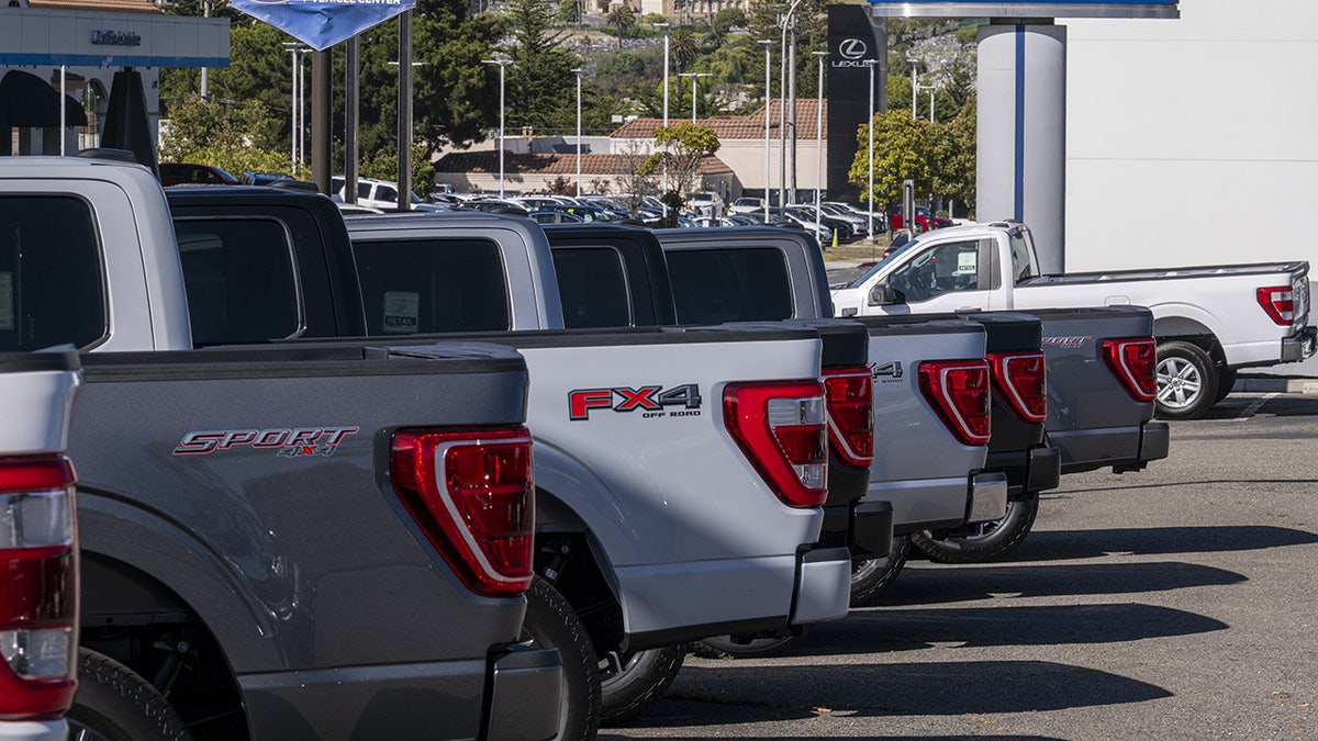 Ford F-150 pickup trucks at a dealership in Colma, California