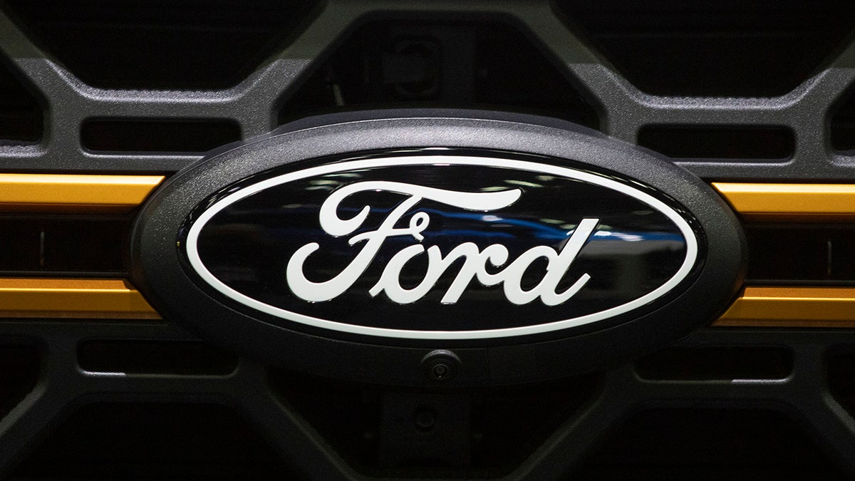 The Ford logo is shown on a Ford truck