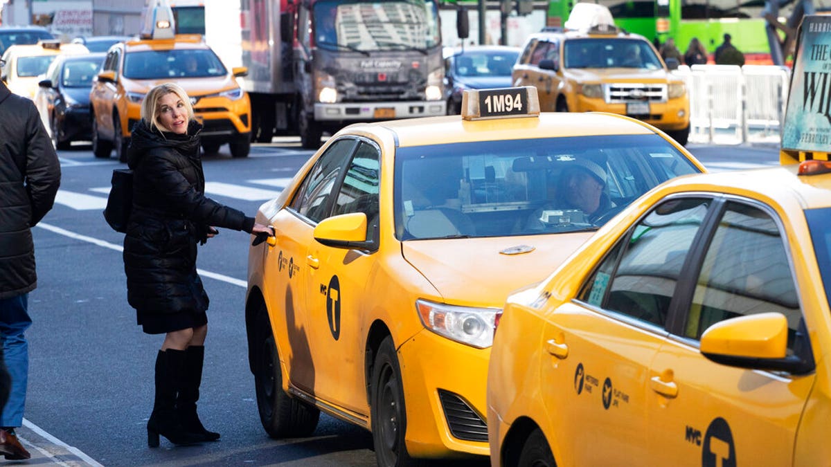 Passenger gets into NYC cab