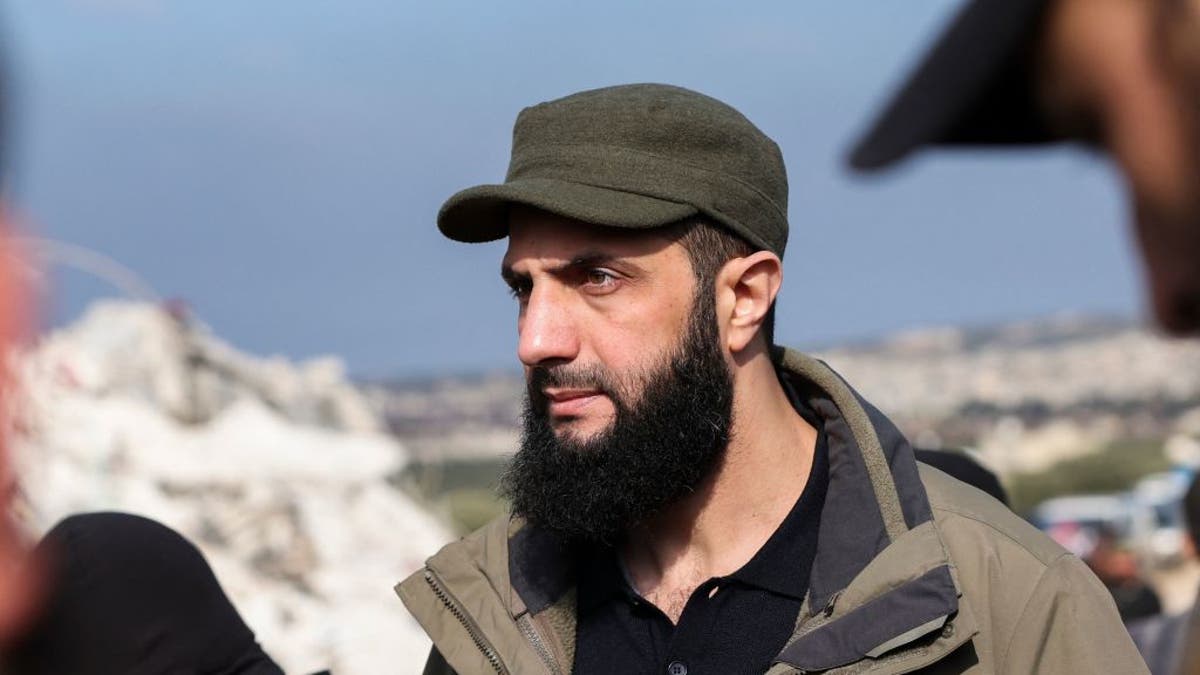 New Syrian leader Ahmed al-Sharaa seen in the village of Besnaya in Syria's rebel-held northwestern Idlib province at the border with Turkey in 2024.