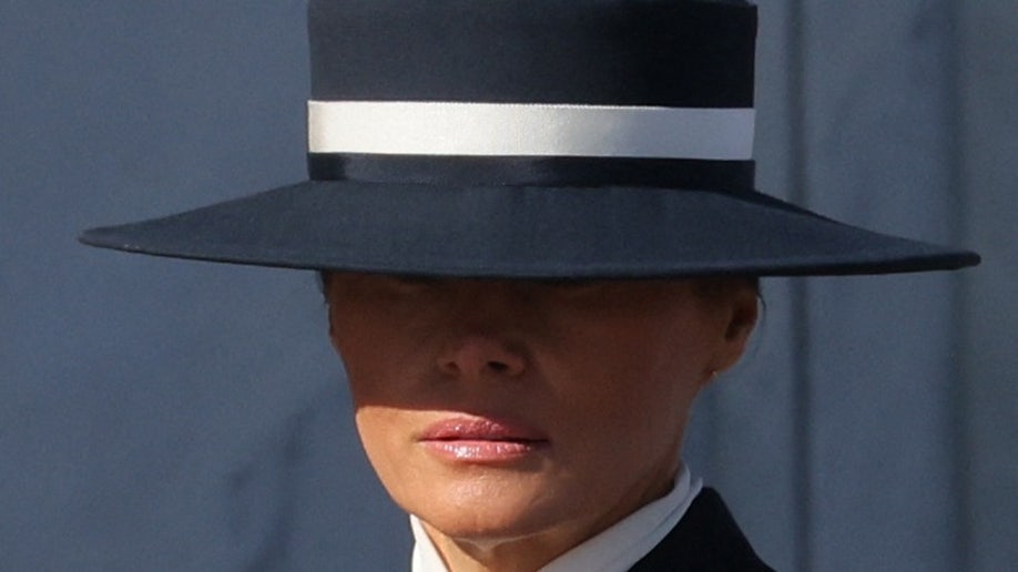 U.S. first lady Melania Trump stands with U.S. President Donald Trump, Former U.S. President Joe Biden and Former U.S. first lady Jill Biden on the inauguration day