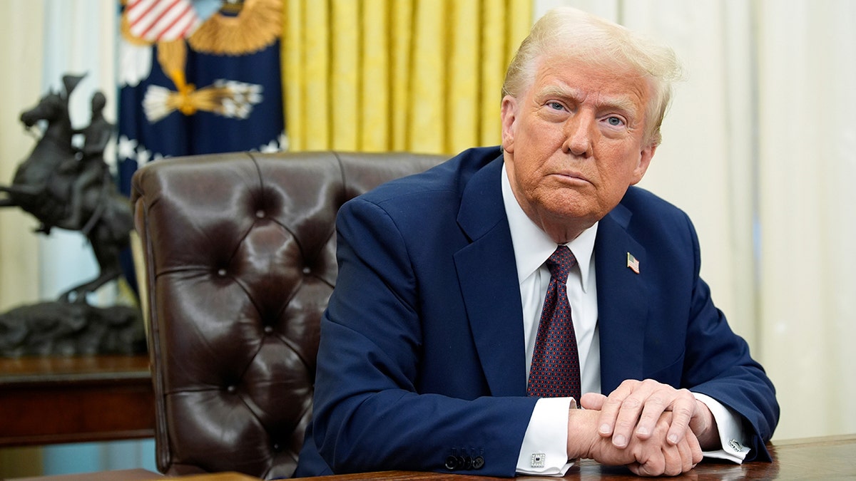 President Donald Trump at Resolute Desk in Oval Office