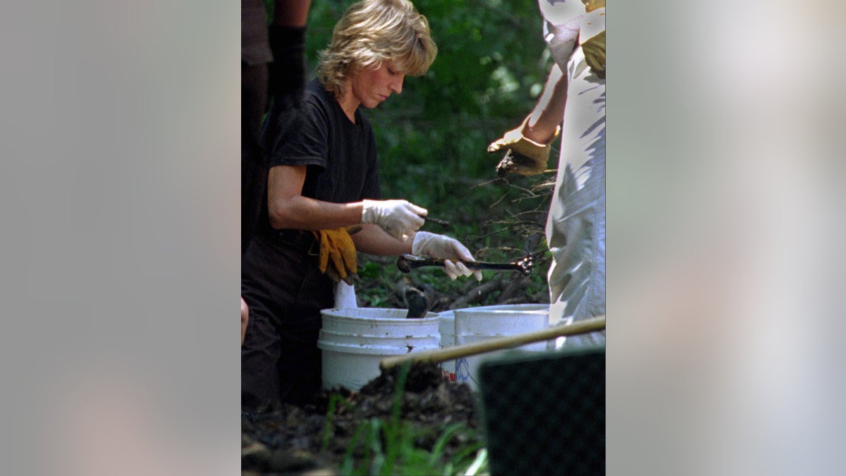 Investigators digging for bones on the grounds of Fox Hollow Farm.