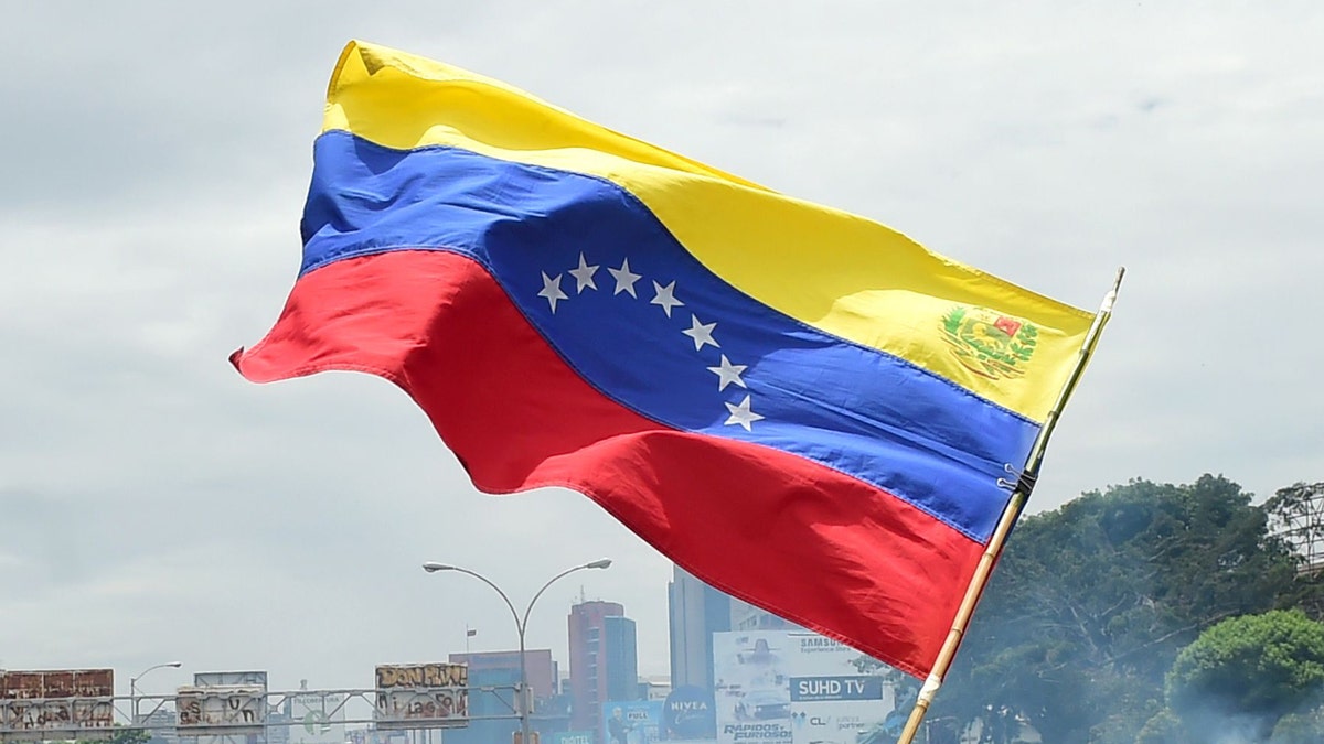 Venezuelan flag flying on pole