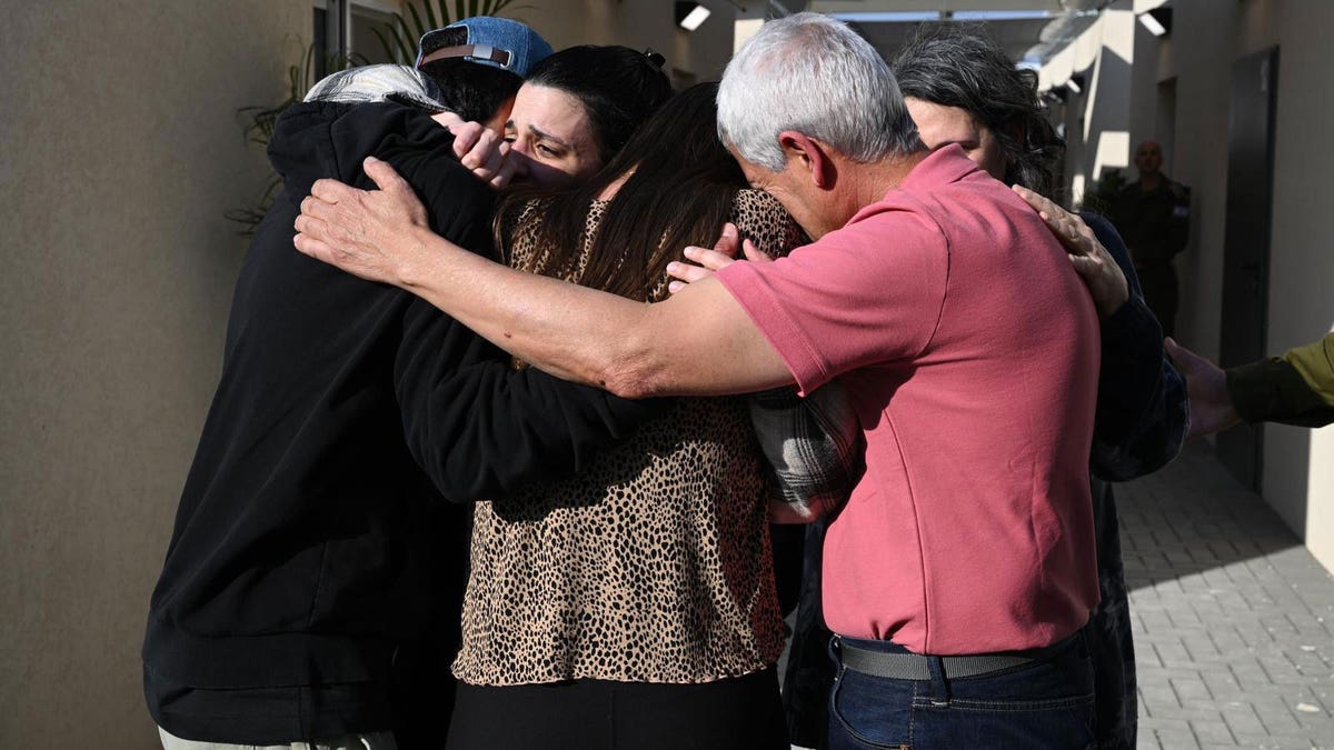 family hugging returned hostage