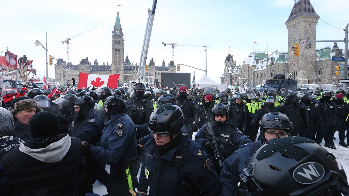 police clash with protesters in Ottawa