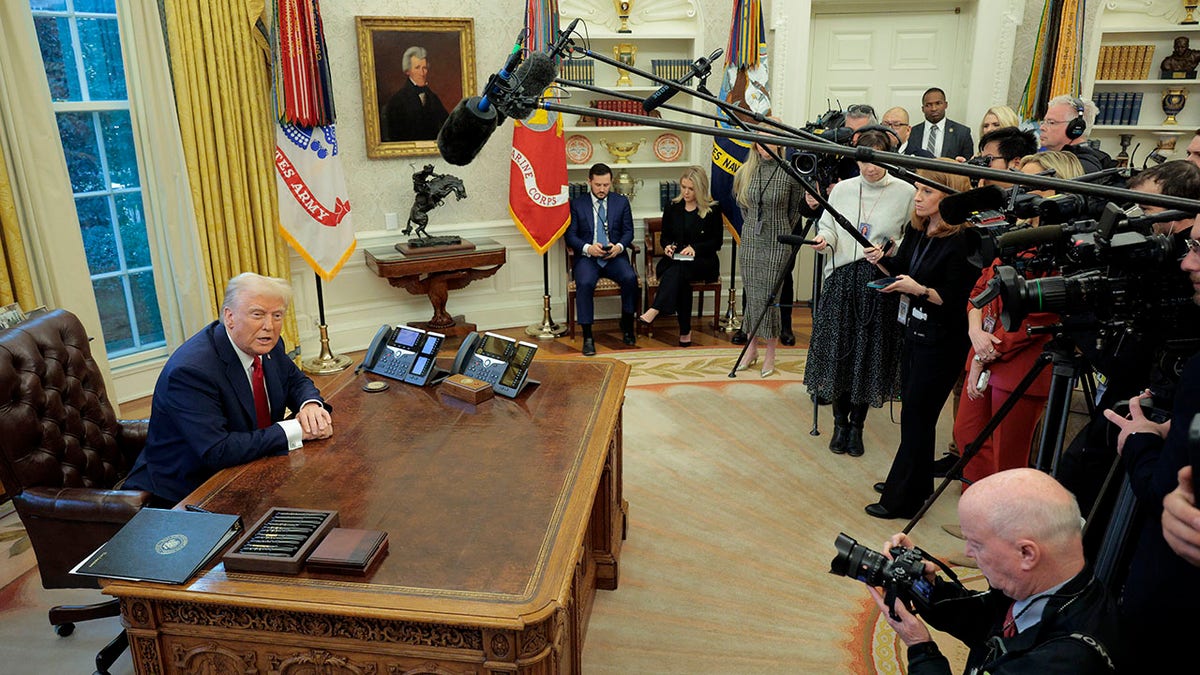 Trump Oval Office signing with media