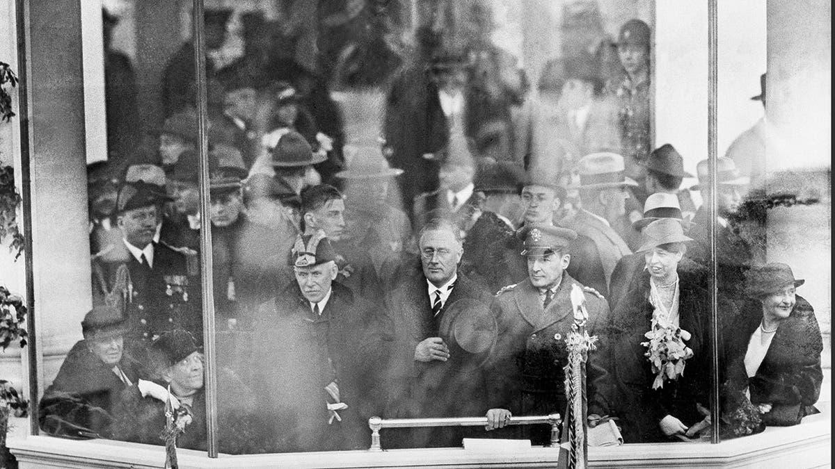 President Franklin D. Roosevelt, center, watches his inaugural parade in Washington