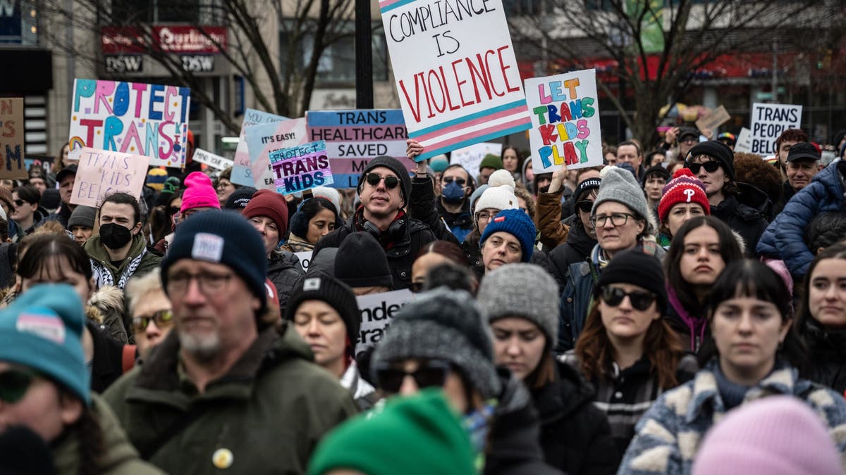 Demonstrators during the Rise Up for Trans Youth rally against President Donald Trump's executive actions targeting transgender people at Union Square in New York City on Saturday, Feb. 7, 2025. Three of New York's most prominent hospitals are curbing transgender medical care for minors after Trump's executive orders put at risk billions of dollars in federal funding.