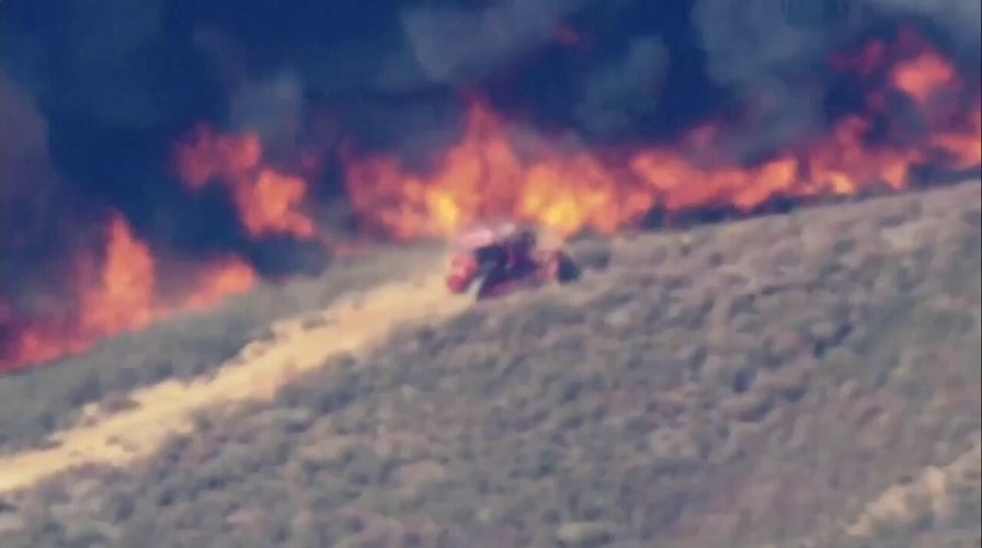 LA County Fire Department bulldozer battles Hughes Fire; residents advised to evacuate