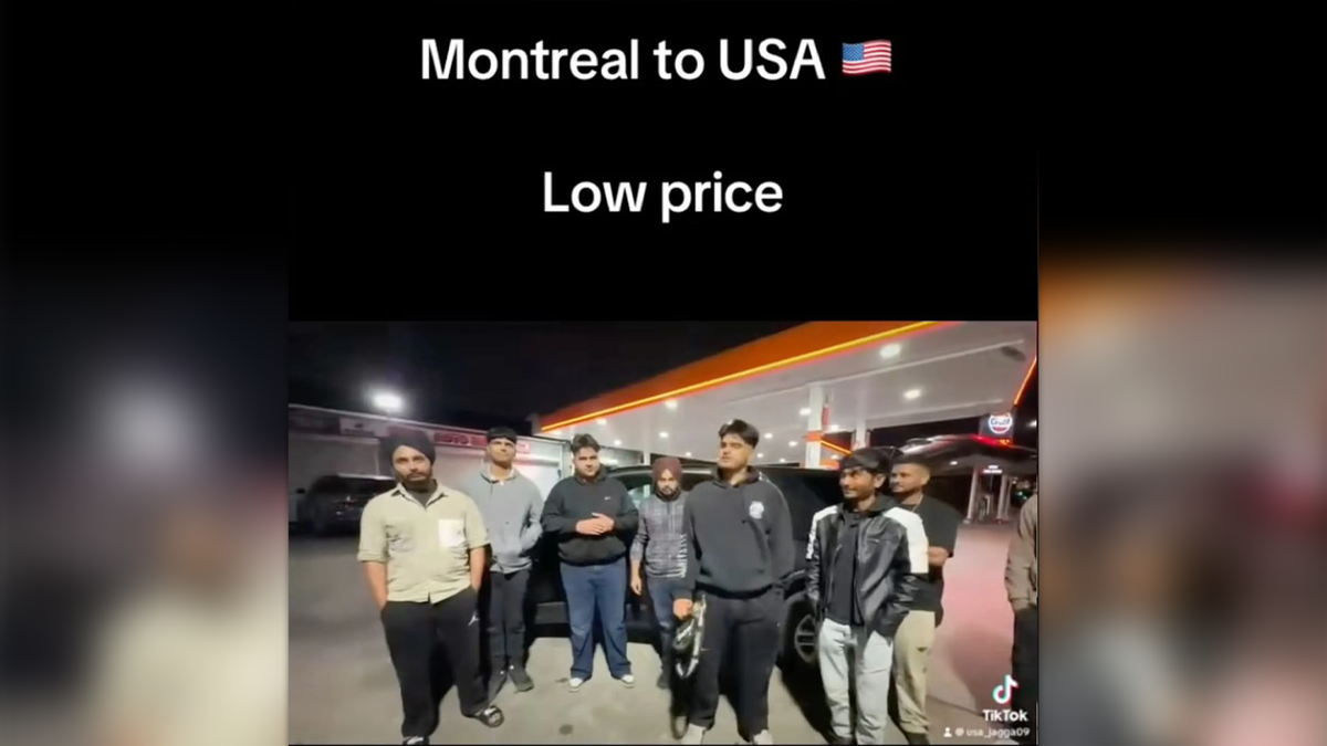 A still image from a TikTOk video showing a group of men at a gas station, with the caption "Montreal to USA low price"