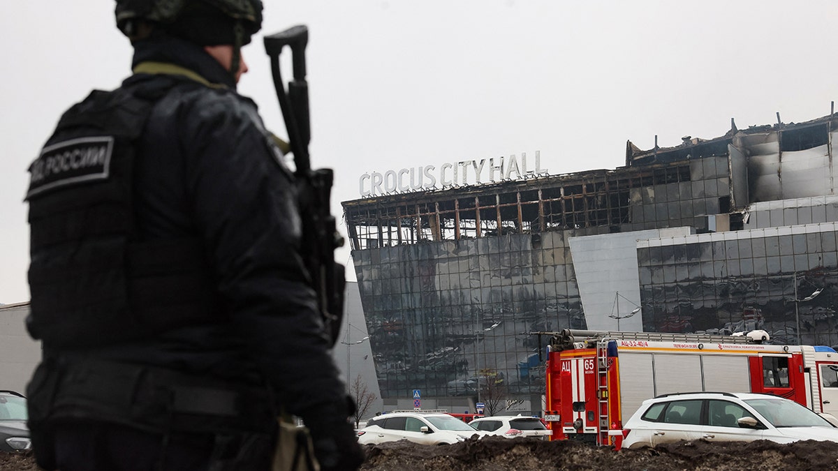 Russian police officer outside Crocus City Hall concert venue