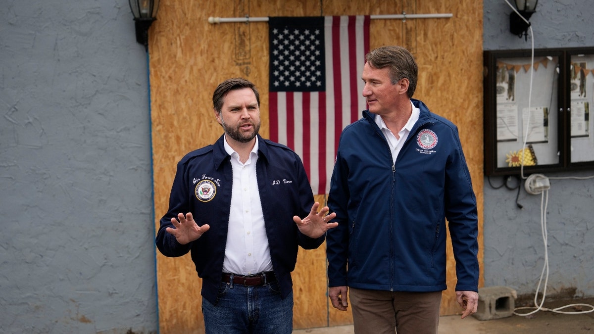 Vice President JD Vance with Gov. Glenn Youngkin, R-Va., right, speaks outside the Damascus Diner, Monday, Jan. 27, 2025, in Damascus, Va., after receiving a briefing on recovery efforts from Hurricane Helene.