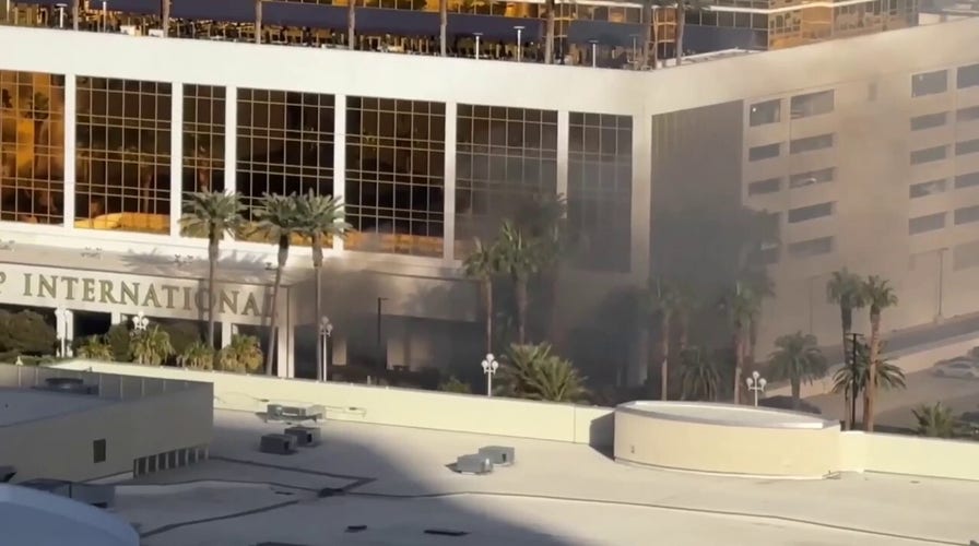 Trump Tower in Las Vegas is evacuated as smoke billows from valet entrance