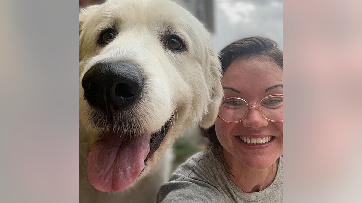 Heather Williams poses with her dog