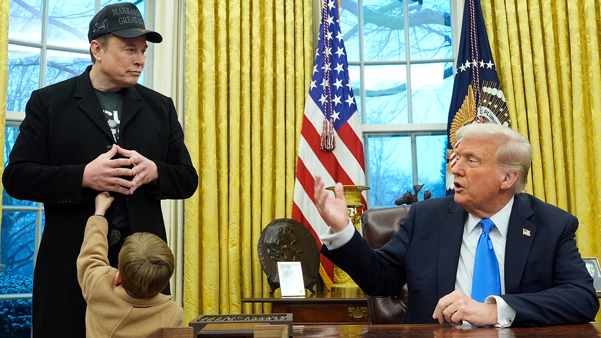 Elon Musk, his son X, and President Donald Trump in the Oval Office