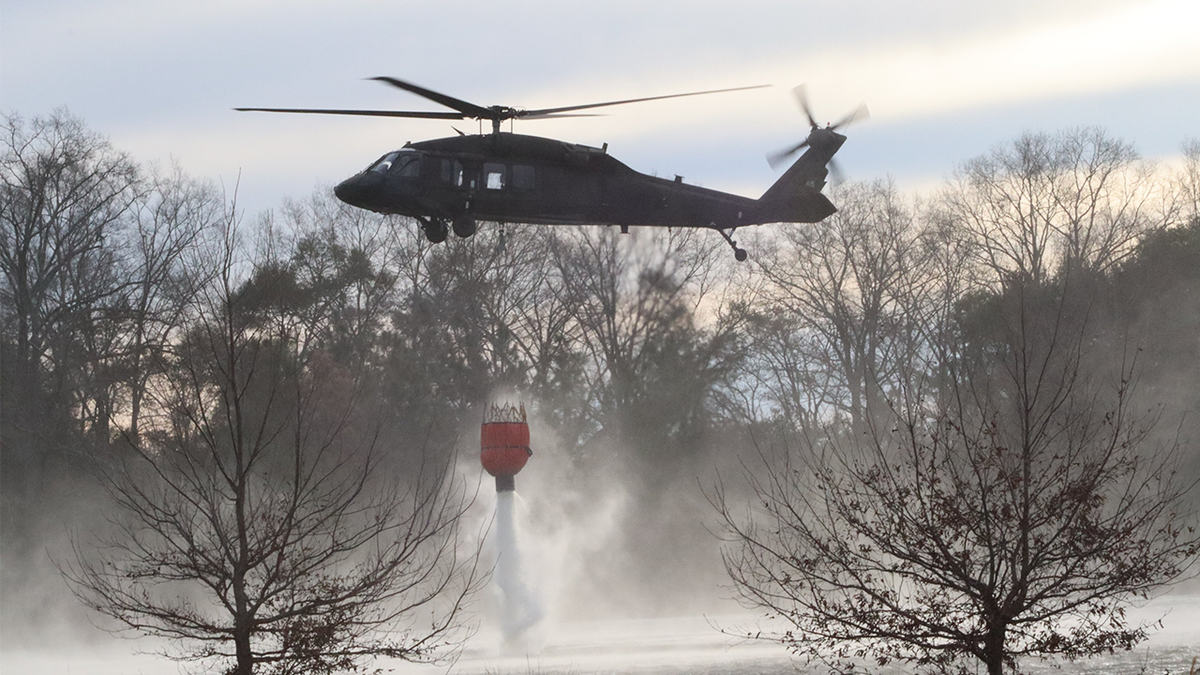 U.S. Army Soldiers with Company A, 111th General Support Aviation Battalion, 59 Aviation Troop Command, South Carolina Army National Guard prepared two Blackhawk Helicopters to assist the South Carolina Forestry Commission and the South Carolina Department of Natural Resources with wildfire containment in Horry County, South Carolina, March 2, 2025.