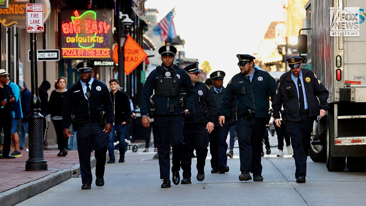 Authorities patrol Bourbon Street as it is reopened in New Orleans, Louisiana