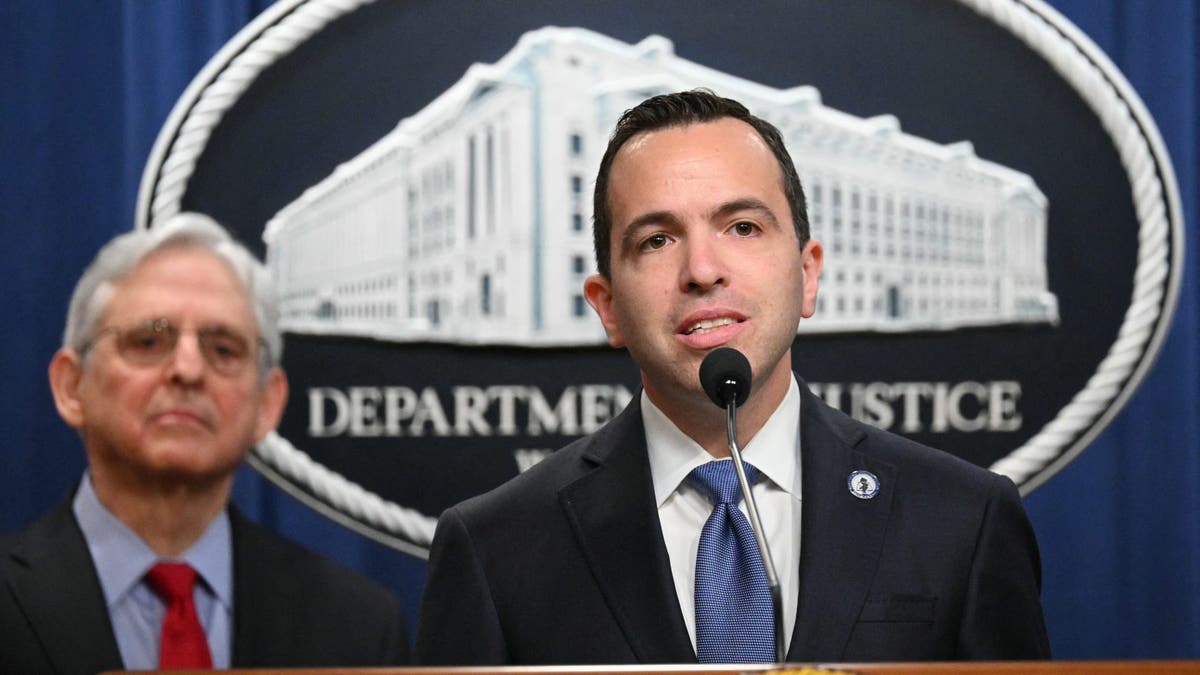 New Jersey Attornet General Matthew Platkin, with Attorney General Merrick Garland (L), speaks during a press conference