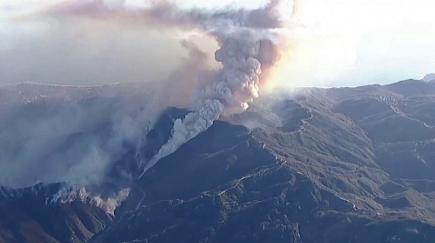 Thousands of Malibu residents under evacuation orders as wildfire surrounds upscale Southern California city 