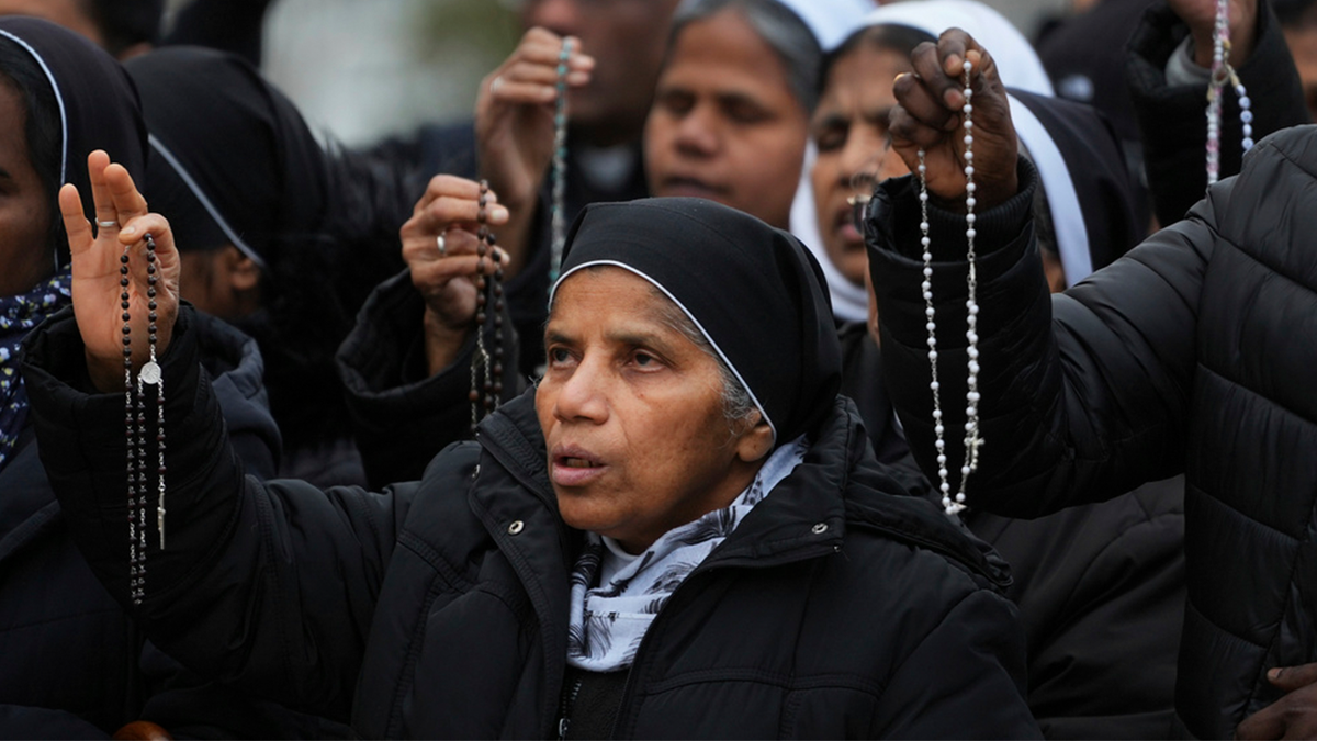 Nuns pray for the pope