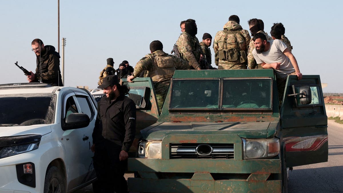 Syrian army in passenger vehicles