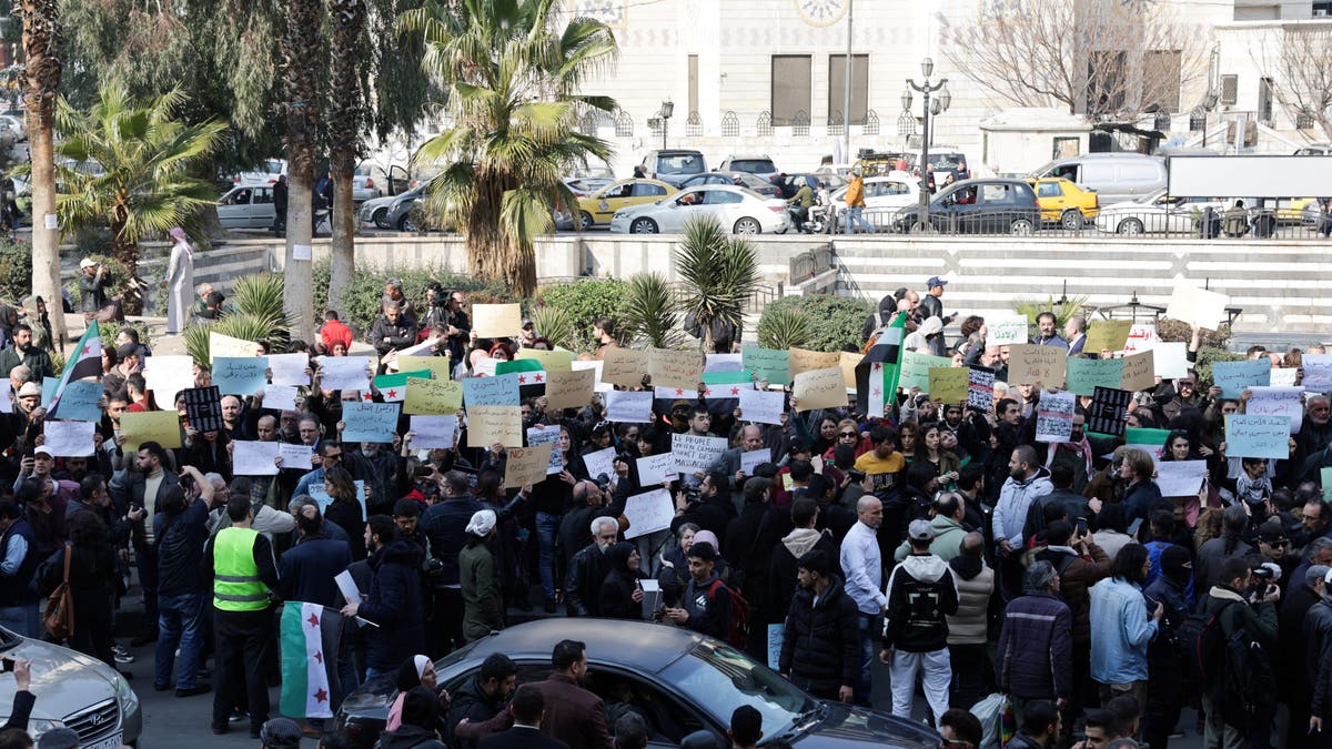 Syrians protesting in Damascus, Syria, March 2025