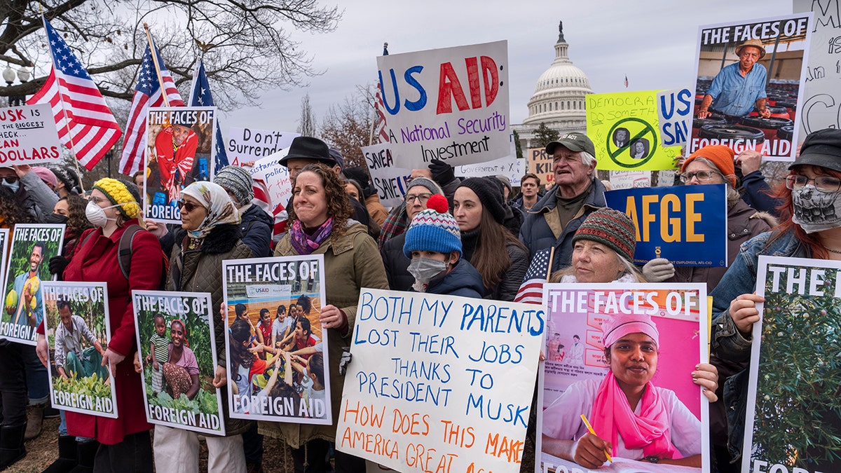 Protesters demand Trump resume USAID payments