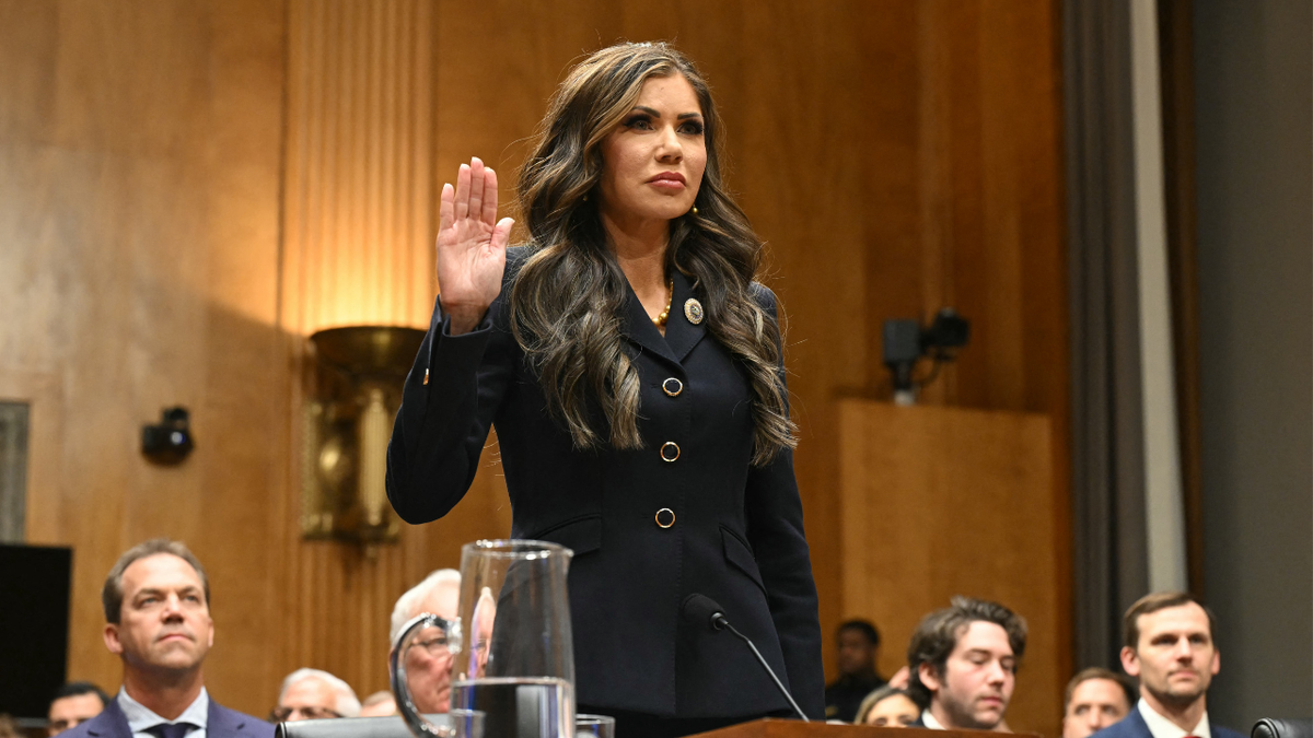 South Dakota Governor Kristi Noem is sworn in during a Senate Homeland Security and Governmental Affairs Committee hearing on her nomination to be Secretary of Homeland Security, on Capitol Hill in Washington, D.C., on Jan. 17, 2025. 