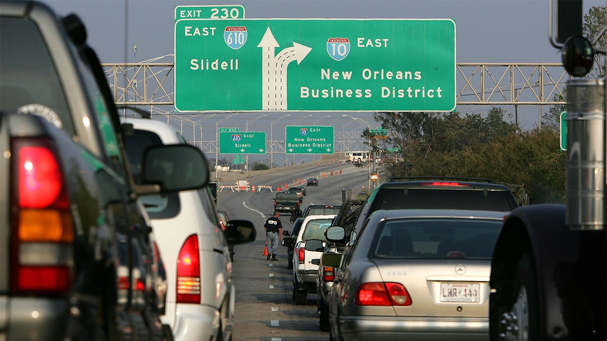 Cars are pictured trying to enter New Orleans on Interstate 10.