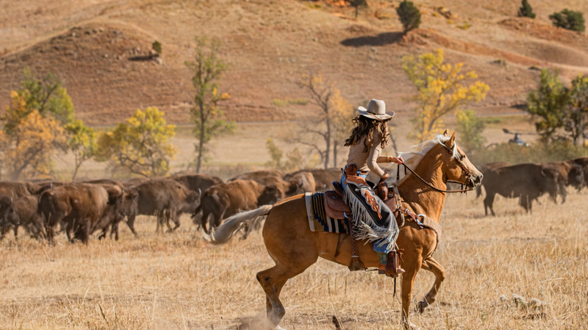 Noem on a horse