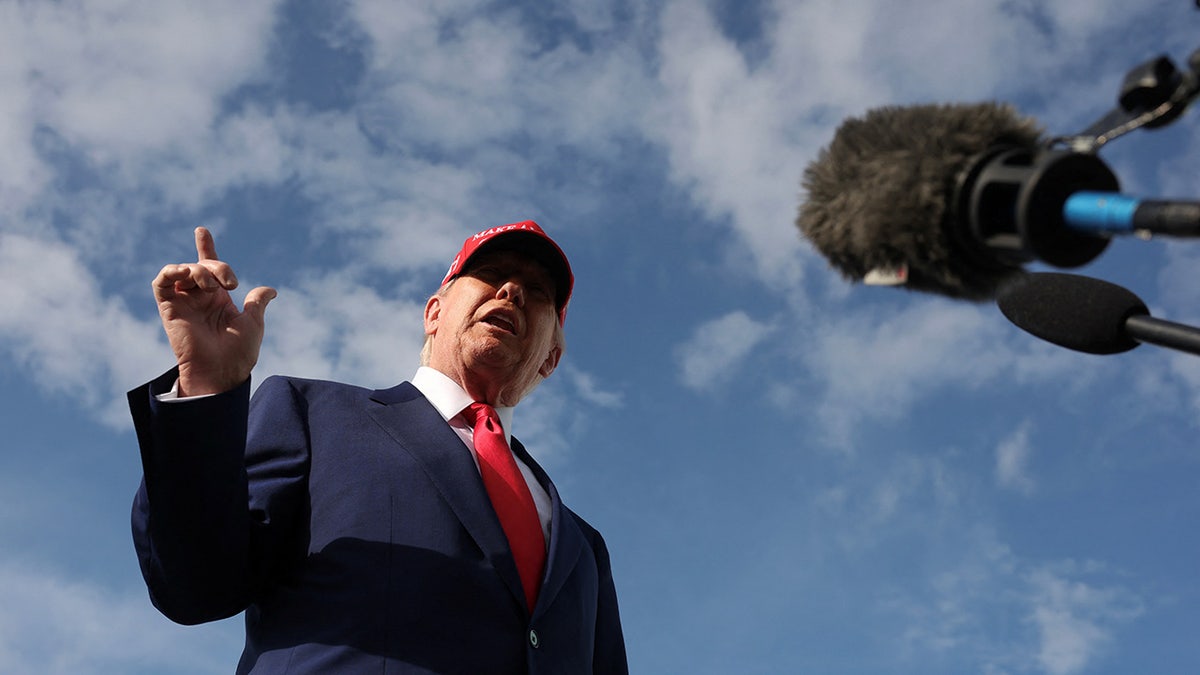 U.S. President Donald Trump speaks to reporters West Palm Beach