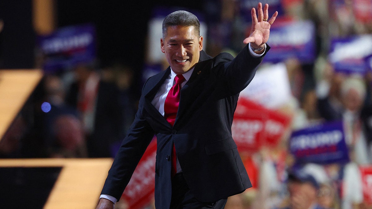 Hung Cao waves from the stage on Day 2 of the Republican National Convention